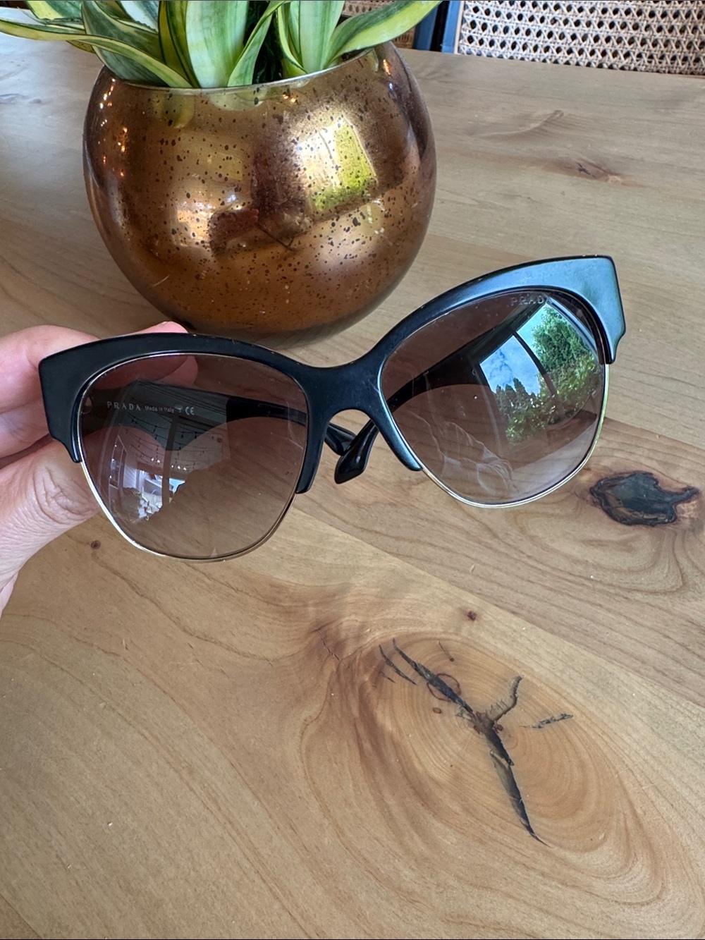 Prada Black Cat-Eye Sunglasses with Brown Gradient Lenses